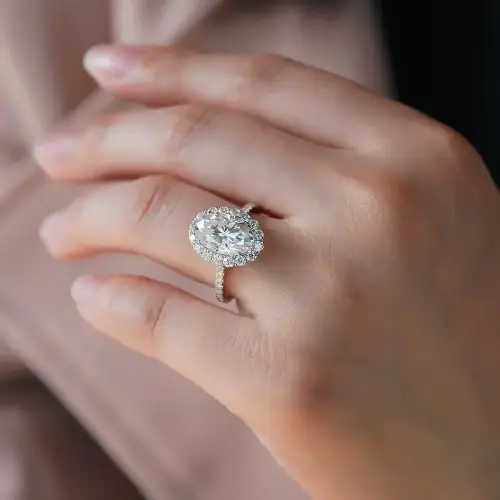 4.5ct Oval with halo and half eternity pavé band