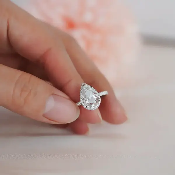 3ct pear cut Moissanite with halo in half eternity pavé band - Image 3