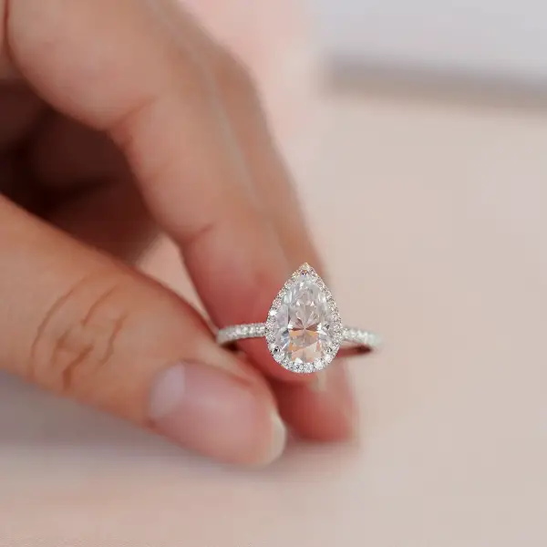 3ct pear cut Moissanite with halo in half eternity pavé band - Image 2