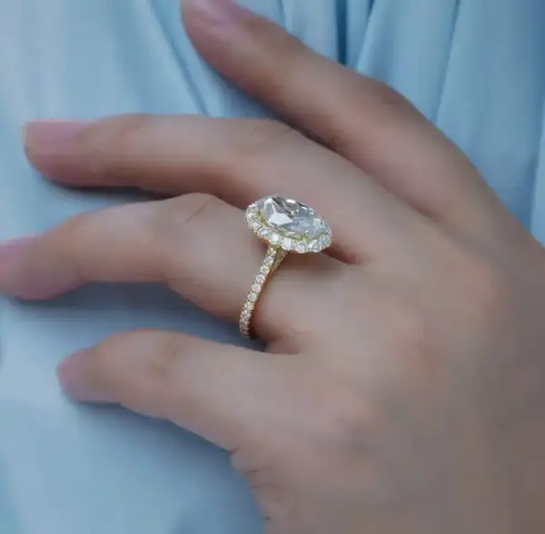 4.5ct oval with halo and pavé band