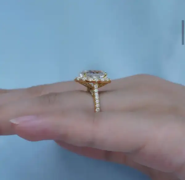 4.5ct oval with halo and pavé band