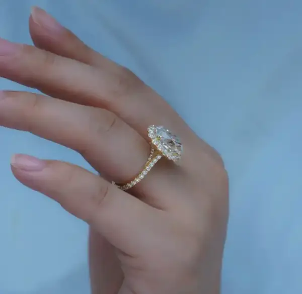 4.5ct oval with halo and pavé band