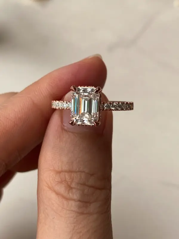2ct 6x8mm Emerald Moissanite with hidden halo and half eternity pavé band - Image 2