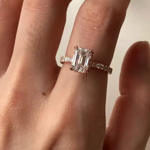 2ct 6x8mm Emerald Moissanite with hidden halo and half eternity pavé band