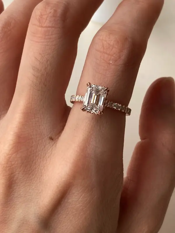 2ct 6x8mm Emerald Moissanite with hidden halo and half eternity pavé band