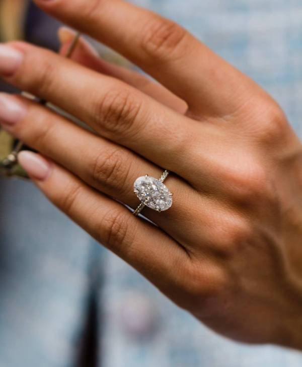 7ct 13.5x8.5mm Crushed Ice Hybrid Oval Moissanite Cut with Hidden Halo and Half Eternity Pavé Band