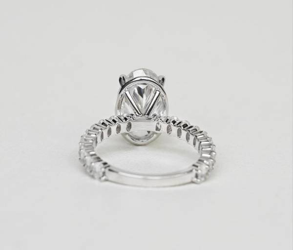 2 ct Crushed Ice Oval Cut Moissanite with Half Eternity Oval Moissanite Pavé Band - Image 5