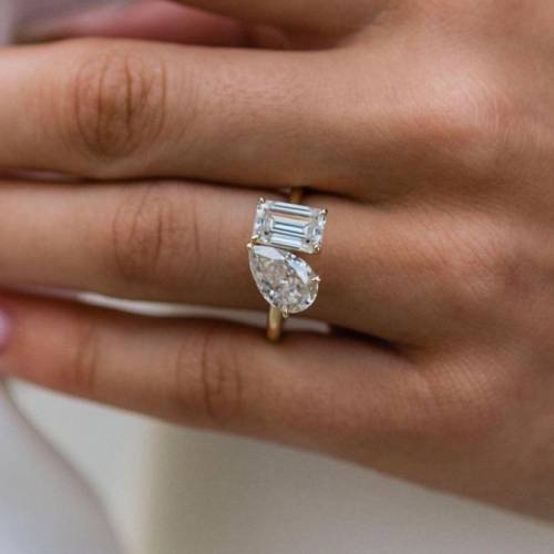 2.25ct 11x7mm Crushed Ice Hybrid Pear Cut and 2ct 8x6mm Emerald Cut Moissanite Ring