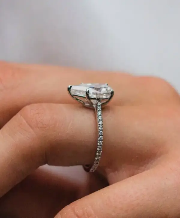 4.1 Ct 12.75x7.75mm Crushed Ice Hybrid Pear Cut Moissanite with Half Eternity Pavé Band
