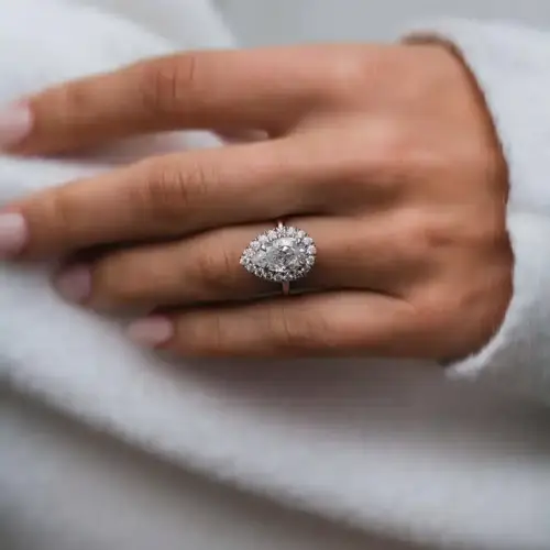 3.3 Ct 12x7.5mm Crushed Ice Hybrid Pear Cut Moissanite with Halo and Bridge Pavé Band