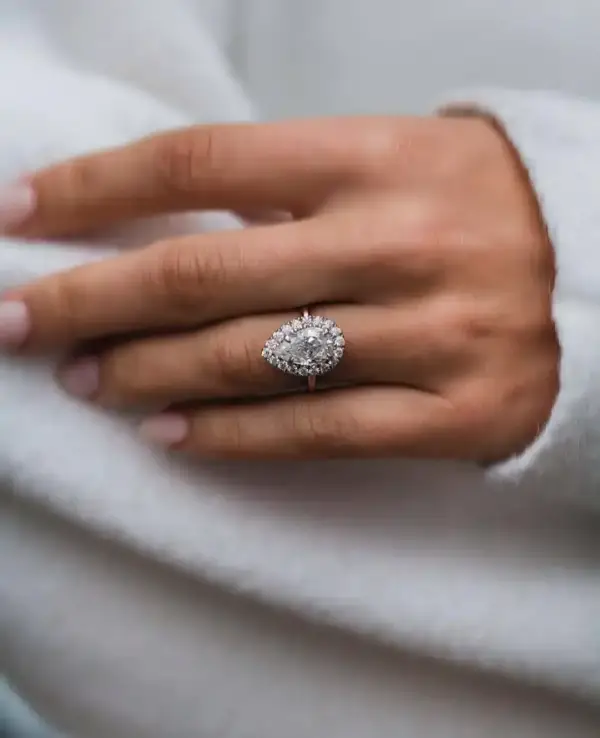 3.3 Ct 12x7.5mm Crushed Ice Hybrid Pear Cut Moissanite with Halo and Bridge Pavé Band