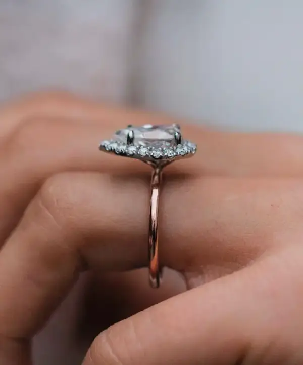 3.3 Ct 12x7.5mm Crushed Ice Hybrid Pear Cut Moissanite with Halo and Bridge Pavé Band