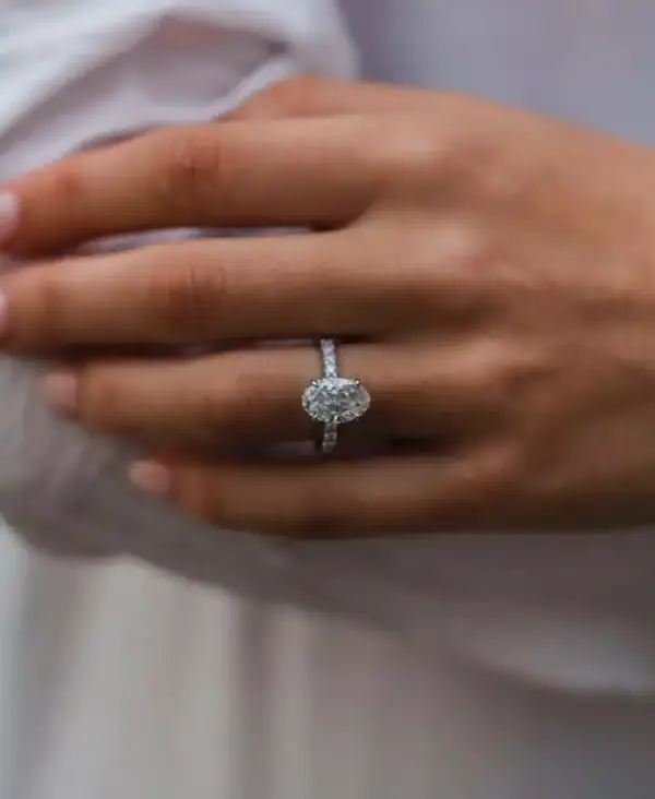 2.9 Ct 10.5x7mm Skinny Crushed Ice Hybrid Oval Cut Moissanite with hidden halo and round Moissanite pavé band