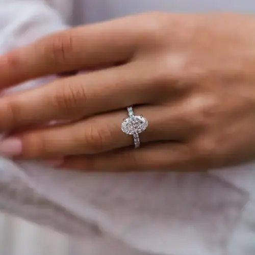 2.9 Ct 10.5x7mm Skinny Crushed Ice Hybrid Oval Cut Moissanite with hidden halo and round Moissanite pavé band