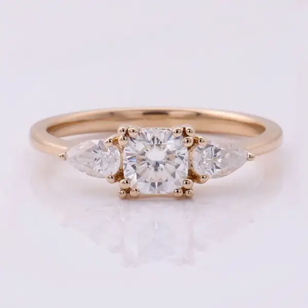 0.6ct Cushion Moissanite Three-Stone Ring