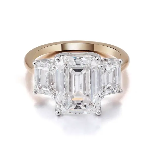 Two-Toned Gold Three-Stone Emerald Moissanite Ring