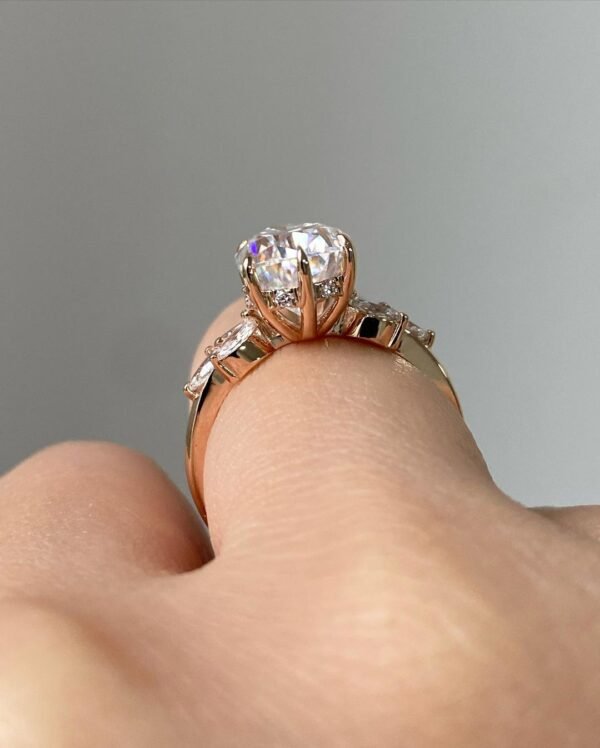 4ct Pear Moissanite with Marquise Cluster Side Stones - Image 3