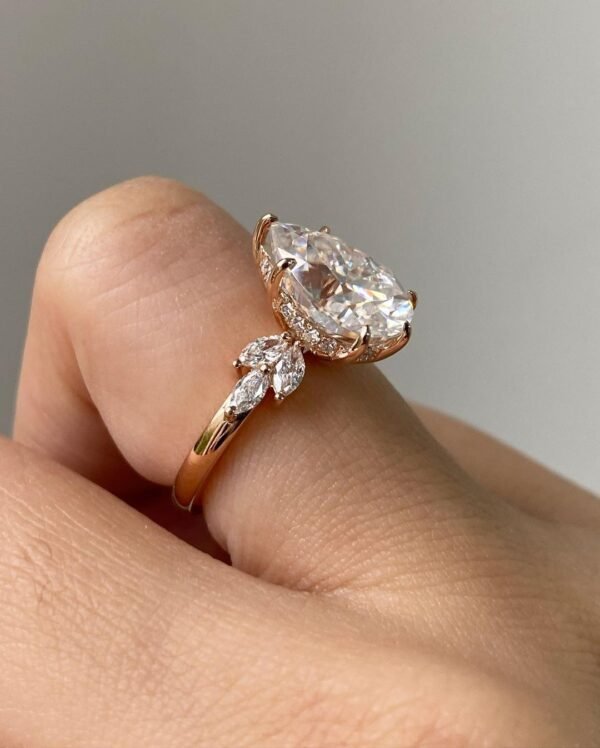 4ct Pear Moissanite with Marquise Cluster Side Stones - Image 2
