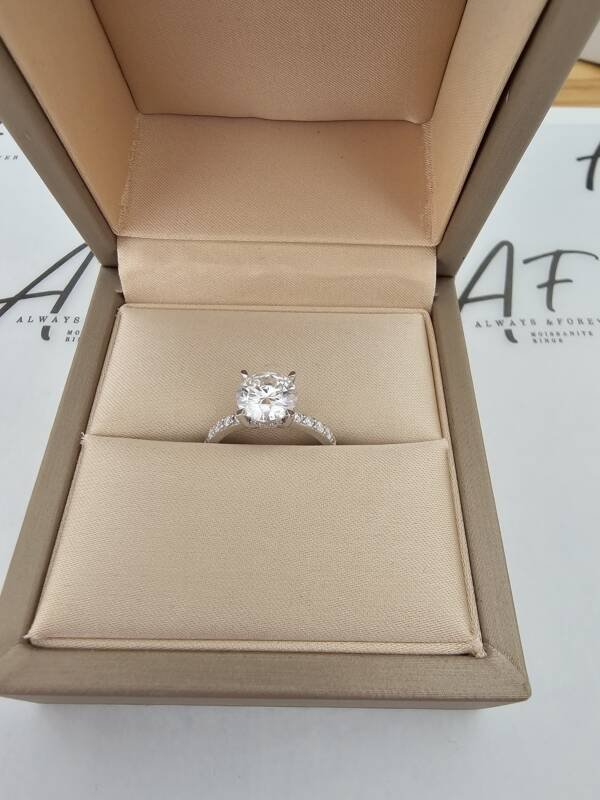 1.5ct Brilliant Round Moissanite With Hidden Halo and Half Pavé Band - Image 7