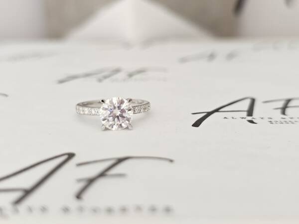 1.5ct Brilliant Round Moissanite With Hidden Halo and Half Pavé Band - Image 6