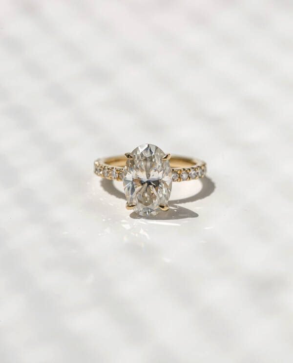 3ct Oval Moissanite With Hidden Halo and Half Eternity Pavé Band - Image 5