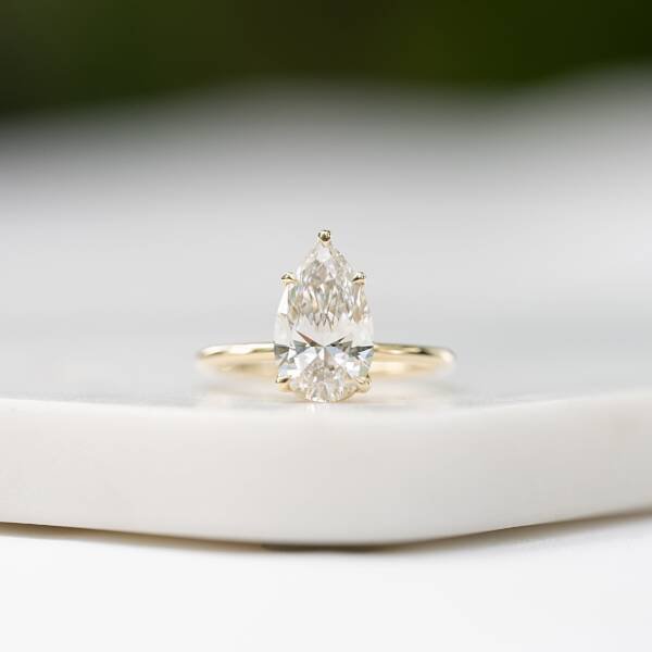 2ct Pear Moissanite with Petal Prongs
