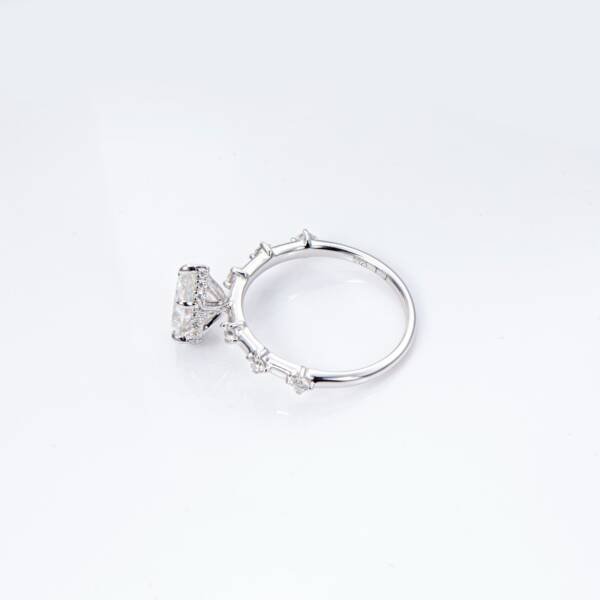 1.5ct Pear Moissanite With Hidden Halo & Accent Band - Image 9