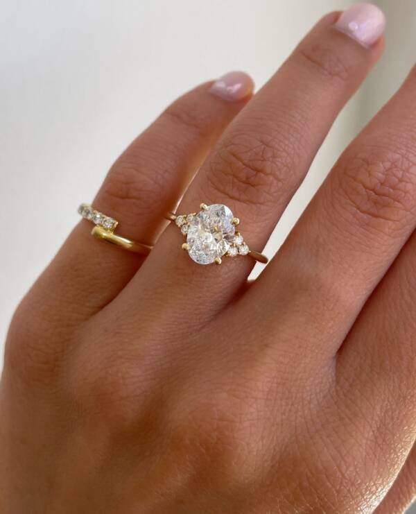 2.01ct 4 claw Oval With Side Accent Stones