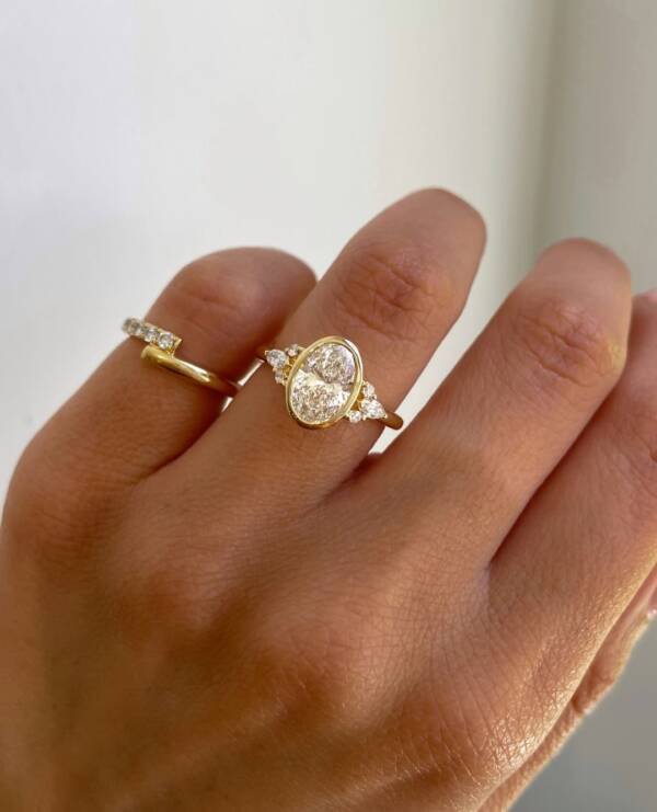 1.7ct Oval Floating Bezel With Side Stones